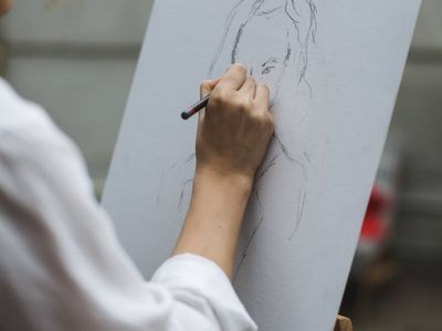 Artist working on a canvas