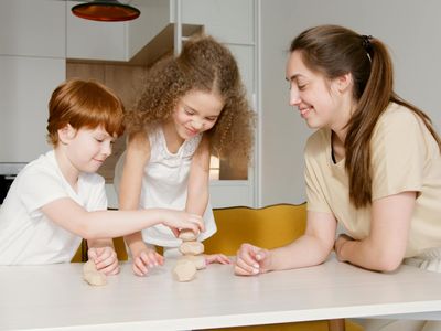 Parent playing with children